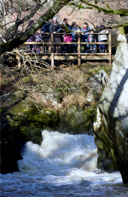 People on salmon platform at Gilfach by David Woodfall