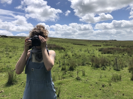 Young person with camera by Silvia Cojocaru