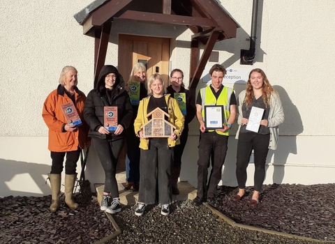 Winncare staff after wildflower seed planting