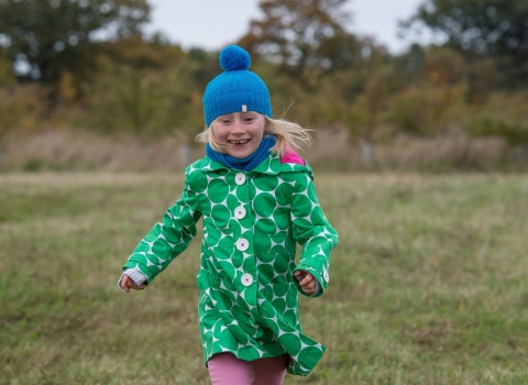 Girl running outdoors